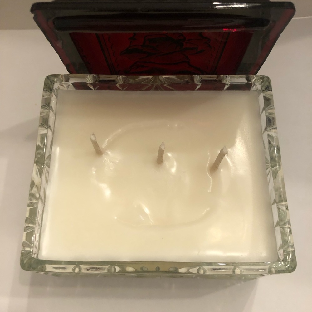 Antique glass trinket box with beautiful deep red top repurposed into a candle.